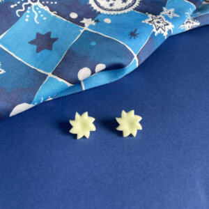 Mini puces d'oreilles en forme de soleil phosphosrecentes